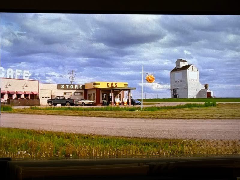 DanReynish's tweet photo. This empty lot and sign are all that remain from the location of one of Canada's greatest ever television comedies!! From 2003 until 2008, #CornerGas filmed 107 live-action episodes right here on the edge of the town of Rouleau, Saskatchewan!! #NotALotGoingOn #TravellingWithDan https://t.co/CaFITqzecy
