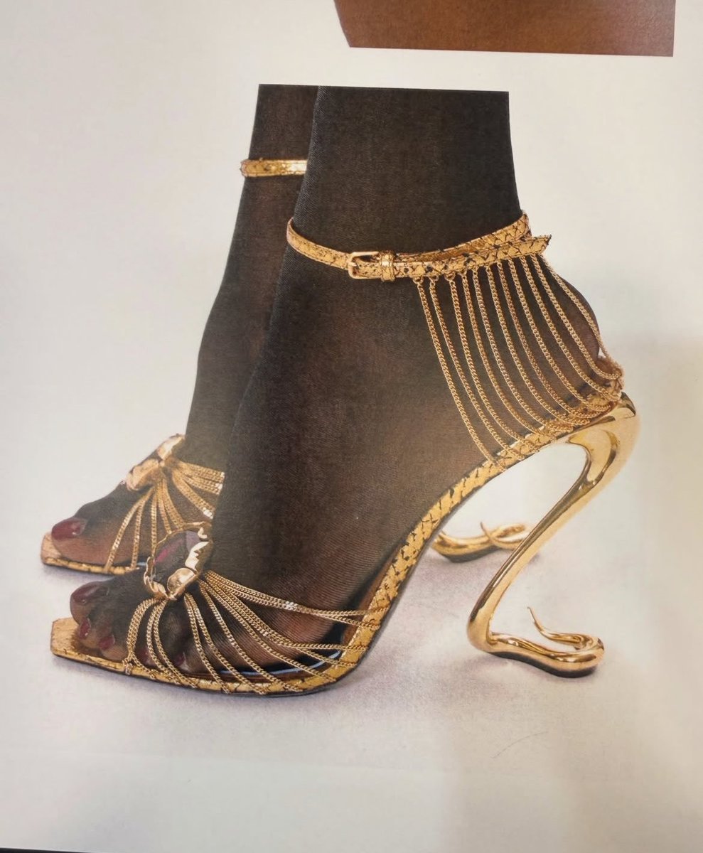 HOMMEALONE's tweet photo. The Gold Saint Laurent Spring 2027 heels designed by Corrado De Biase https://t.co/VRJ6ufGBQZ