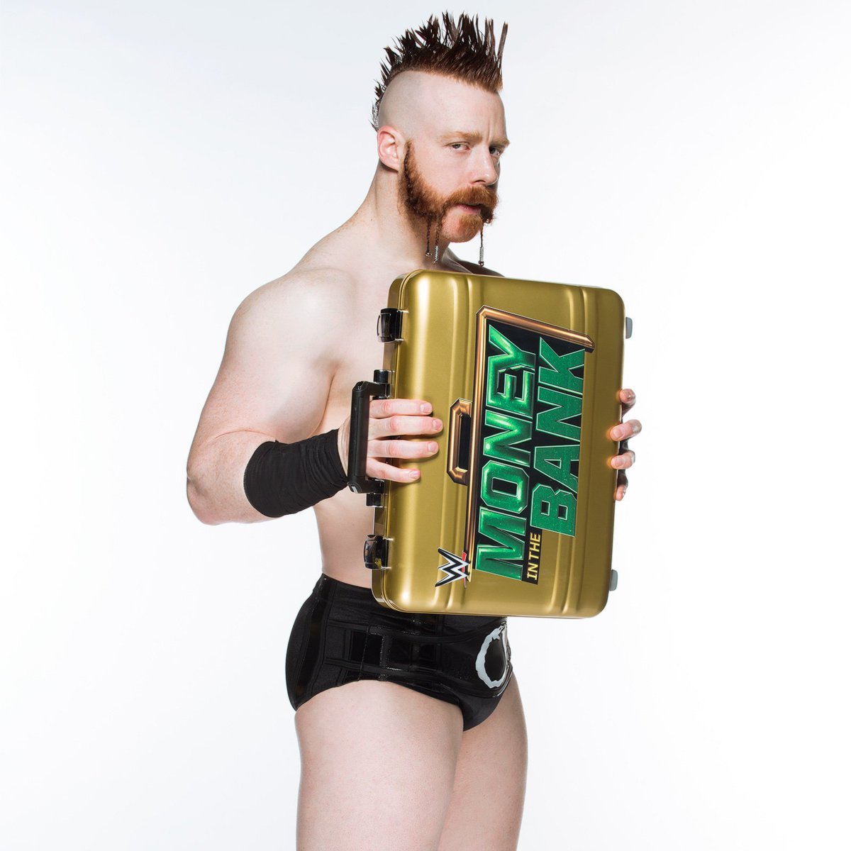 WrestleCourt's tweet photo. The gold Money in the Bank briefcase was so elite. https://t.co/mFvsokhK9z