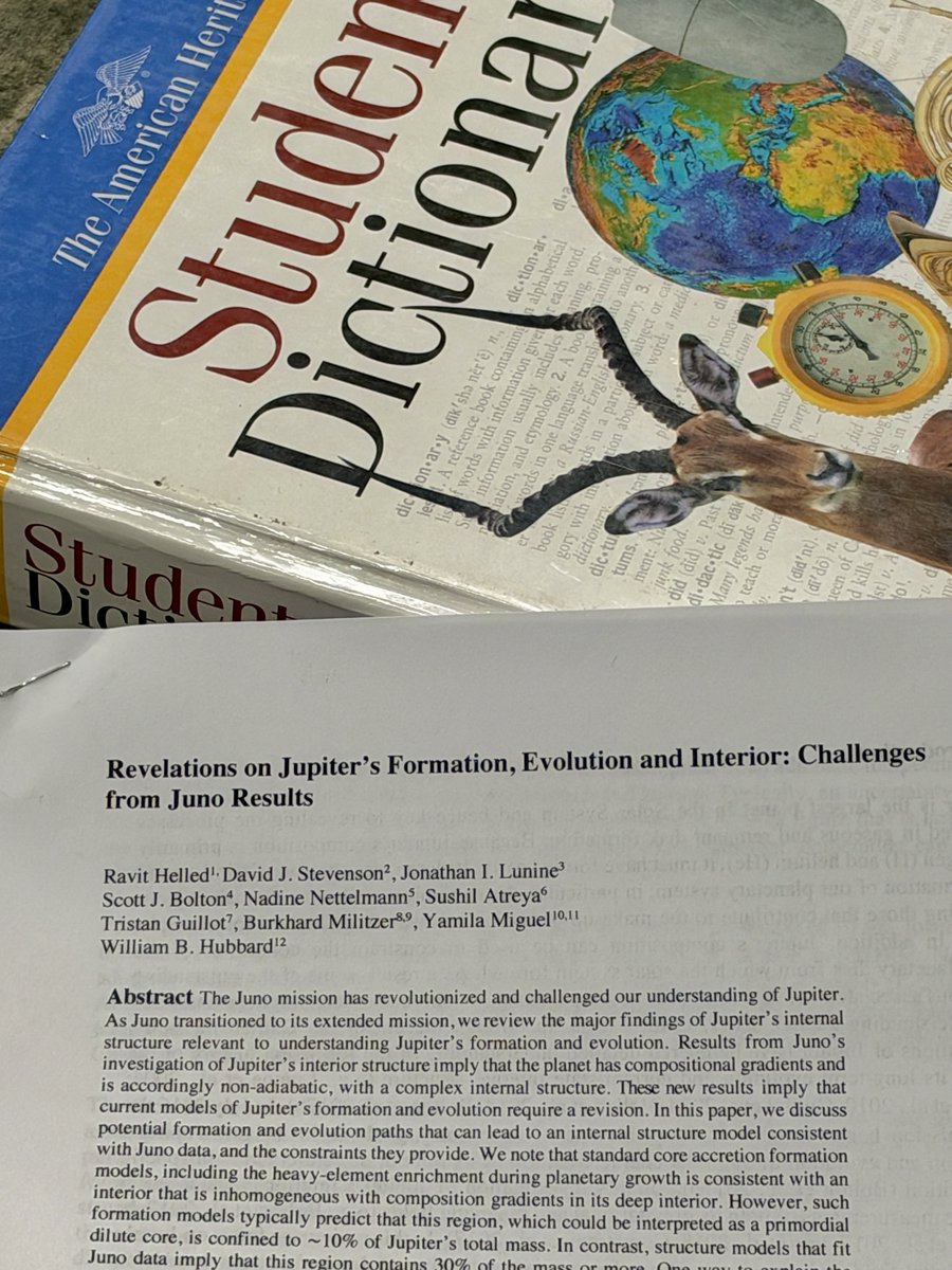 mbateman's tweet photo. 6yo didn’t move from the spot all day, literally stayed in from recess, and when I finally go to see what she’s doing I find an astrophysics paper from 2022 and a dictionary 

what is happening https://t.co/qQIeqJIeg8