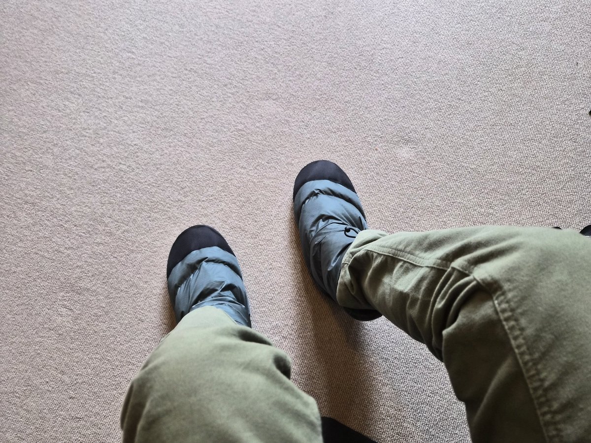 Manukattw's tweet photo. Can't work from home without my down booties https://t.co/ttt2zI60xC