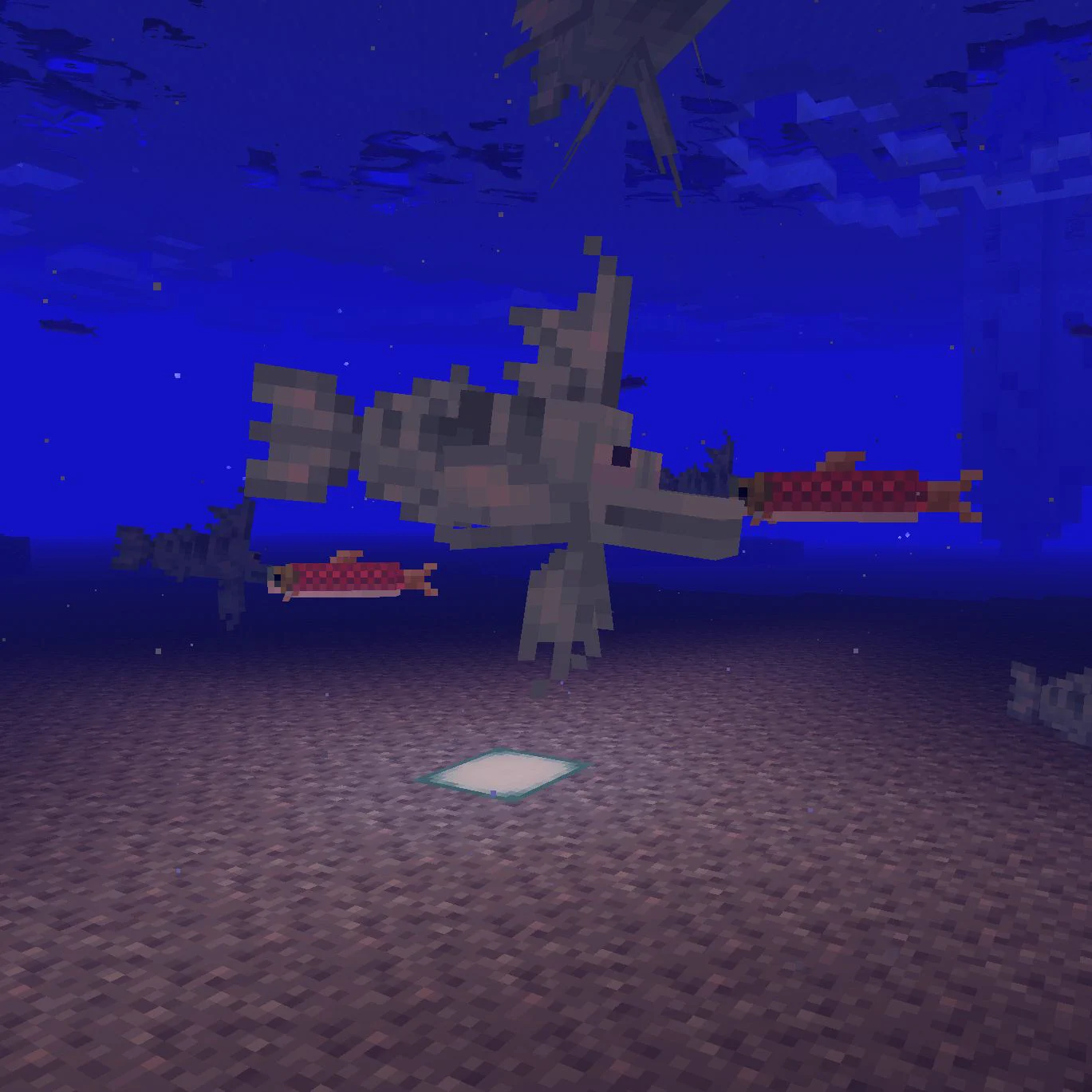 A Minecraft screenshot showing an icefish under water.