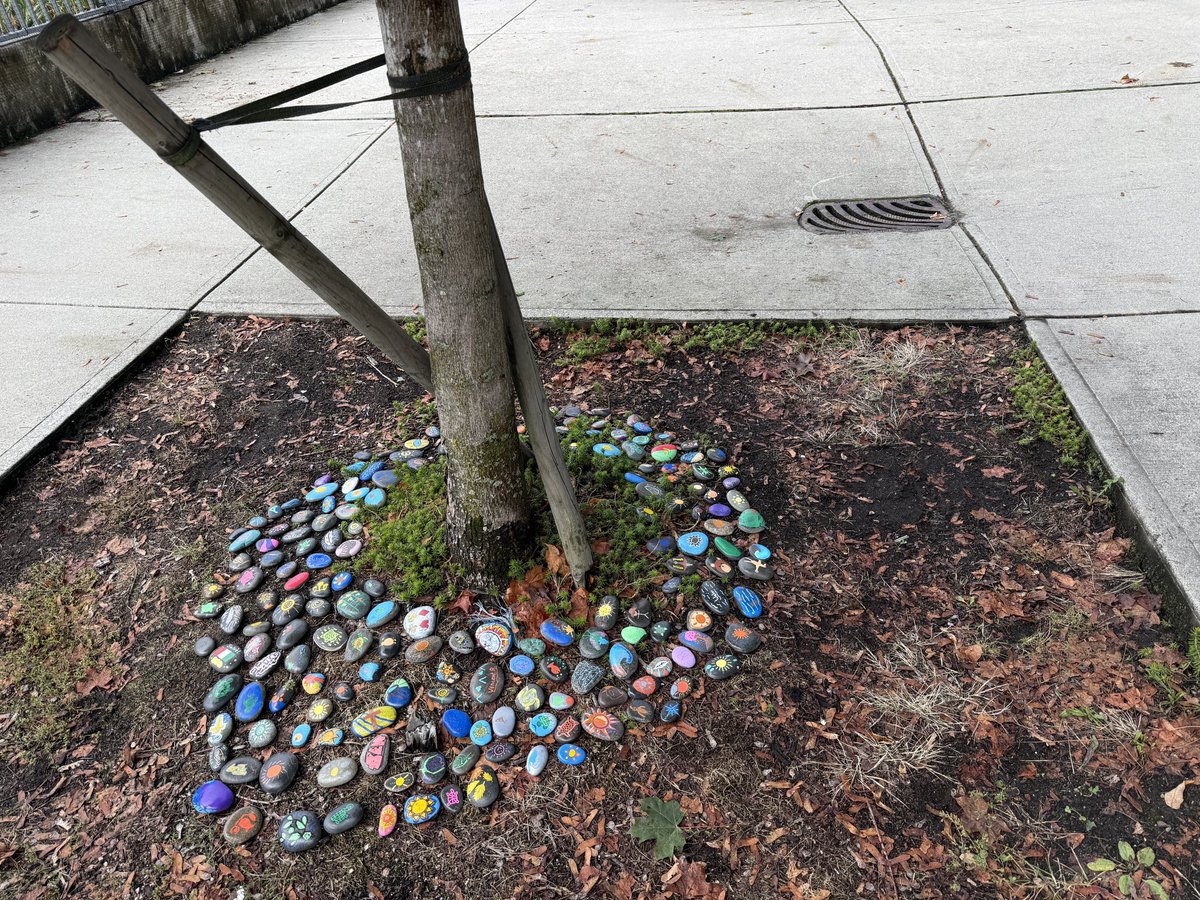 CristinaMcA41's tweet photo. A reverent walk today with Student Government’s guidance, for Truth &amp; Reconciliation. And now the front of the school bears our own art installation complete with some of our grade 8 Retreat Story Stones. #everychildmatters https://t.co/I5DmkIfNxW