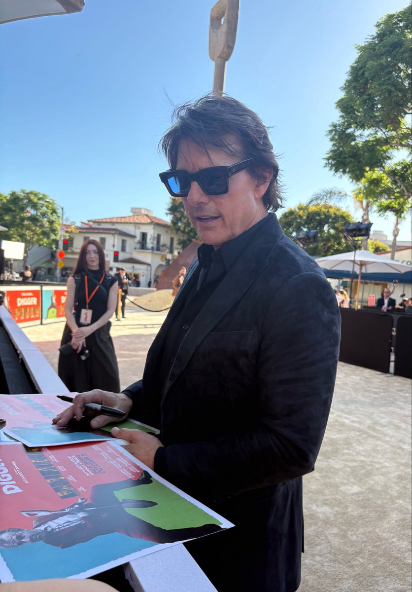 MikaylaWish's tweet photo. Tom Cruise is such an incredible human! Been waiting 34 years to meet him. Made my year! He arrived hours early to meet each fan individually to sign/take photos with us. Not many people do that! Also, Glen Powell was incredibly nice as welll.     @TomCruise #Digger #tomcruise https://t.co/kT8XsSQ5eP