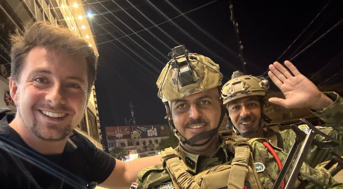 Lordmiles's tweet photo. I got detained by Iraqi police at a remote checkpoint who called special tactical regiment. 

They said it’s too dangerous to walk this road at night due to gangs of dogs and Isis. I responded by saying I didn’t know there was any jews in Iraq. 

They laughed.

Eventually they realised I was cool and gave me a ride back to my hotel saying I should wait on some permits tomorrow from the intelligence agency.

They kindly gave me a cigarette and said welcome to Iraq. They were very cool. Thank you lads for the ride! 🇮🇶

Day 13, 25% of the country walked.