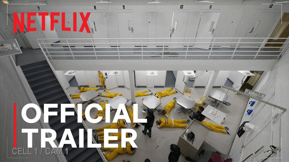 A scene from a prison with multiple people in yellow jumpsuits lying on the floor; overlaid text reads 'NETFLIX OFFICIAL TRAILER CELL 1 / CAM 1'.