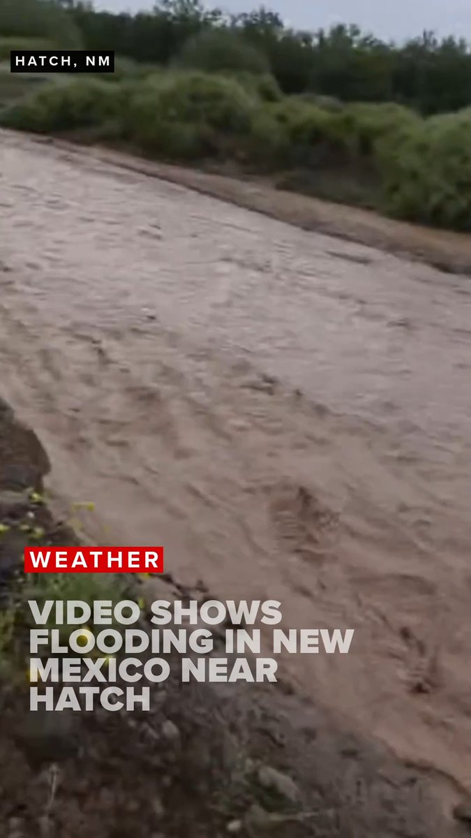 A fast-flowing, muddy floodwater rush fills the frame, illustrating the dangerous flash flooding in Hatch Valley, New Mexico, as labeled by on-screen text reading "HATCH, NM" and "WEATHER: VIDEO SHOWS FLOODING IN NEW MEXICO NEAR HATCH." The image accompanies news of immediate evacuations ordered for Hatch and nearby communities including Rincon, Salem, and Garfield.