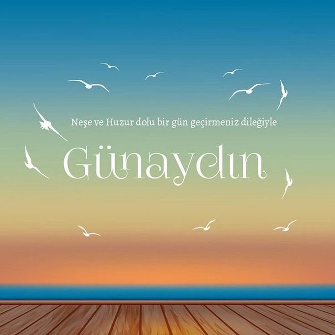 A greeting card graphic with a sunset sky, flying birds, and wooden deck features Turkish text reading 'Neşe ve Huzur dolu bir gün geçirmeniz dileğiyle Günaydın' (Have a day full of joy and peace, Good morning).