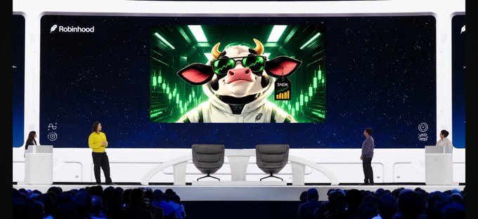 An investor presentation stage features a large screen displaying the Robinhood logo and an animated cow wearing sunglasses, with people standing on stage before an audience.