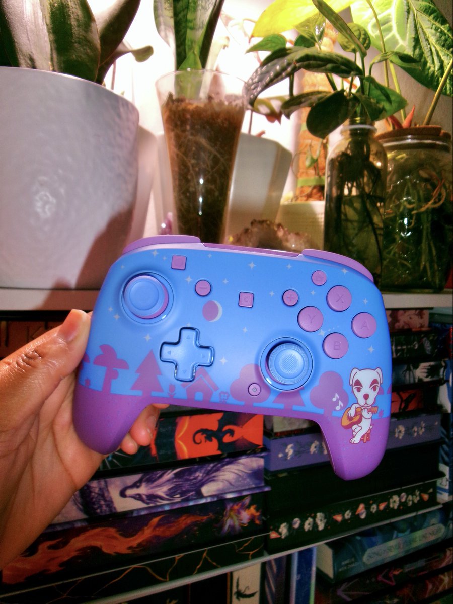 cosmicfairiex's tweet photo. Wow! I am so in love with this new Animal Crossing controller.
Pictures don’t even do it justice. 💜 https://t.co/0g1XpzQbcW