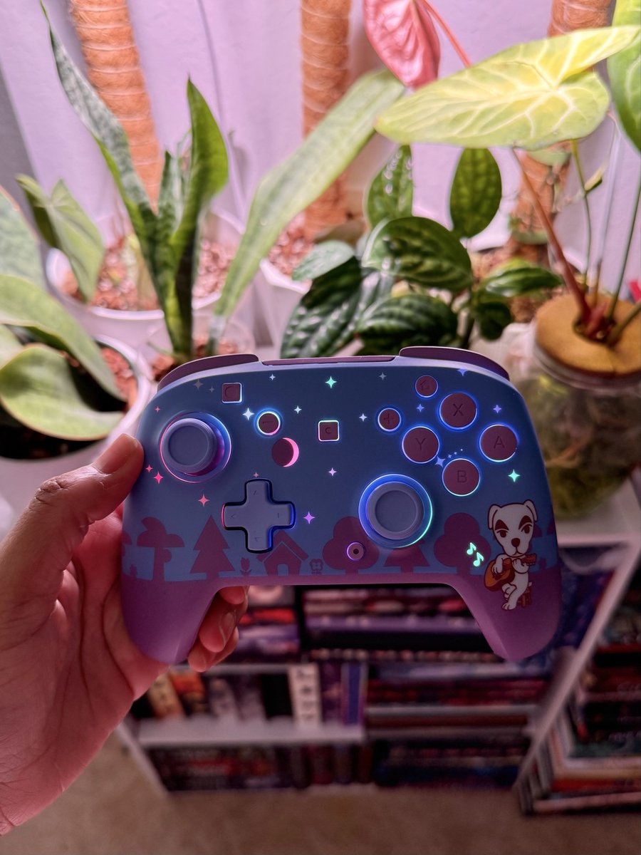 cosmicfairiex's tweet photo. Wow! I am so in love with this new Animal Crossing controller.
Pictures don’t even do it justice. 💜 https://t.co/0g1XpzQbcW