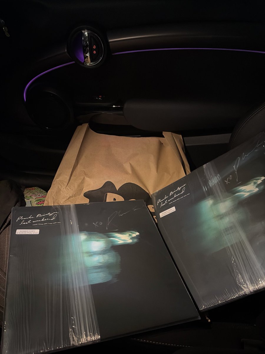 starlightshoax's tweet photo. bag secured from the vinyl shop in philly 🤍 SIGNED PHOEBE VINYLS! she signed them on my show date in philly 🥹🥹🥹 (one is for my friend who went with me!) https://t.co/ZnIYIo5Ddy