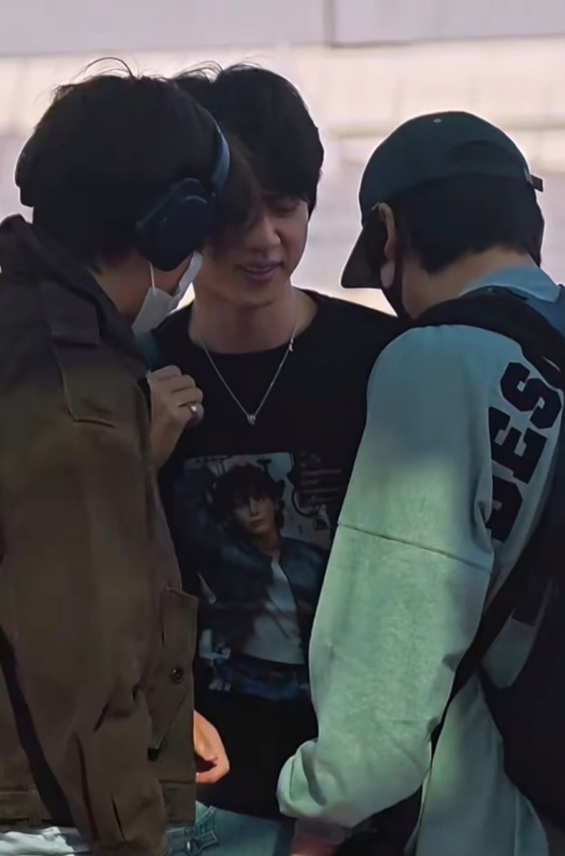 koovarbie's tweet photo. Taekook looking at Jin's T-shirt with Jungkook's face on it 😭😭😭 https://t.co/1xrE1FqiU9