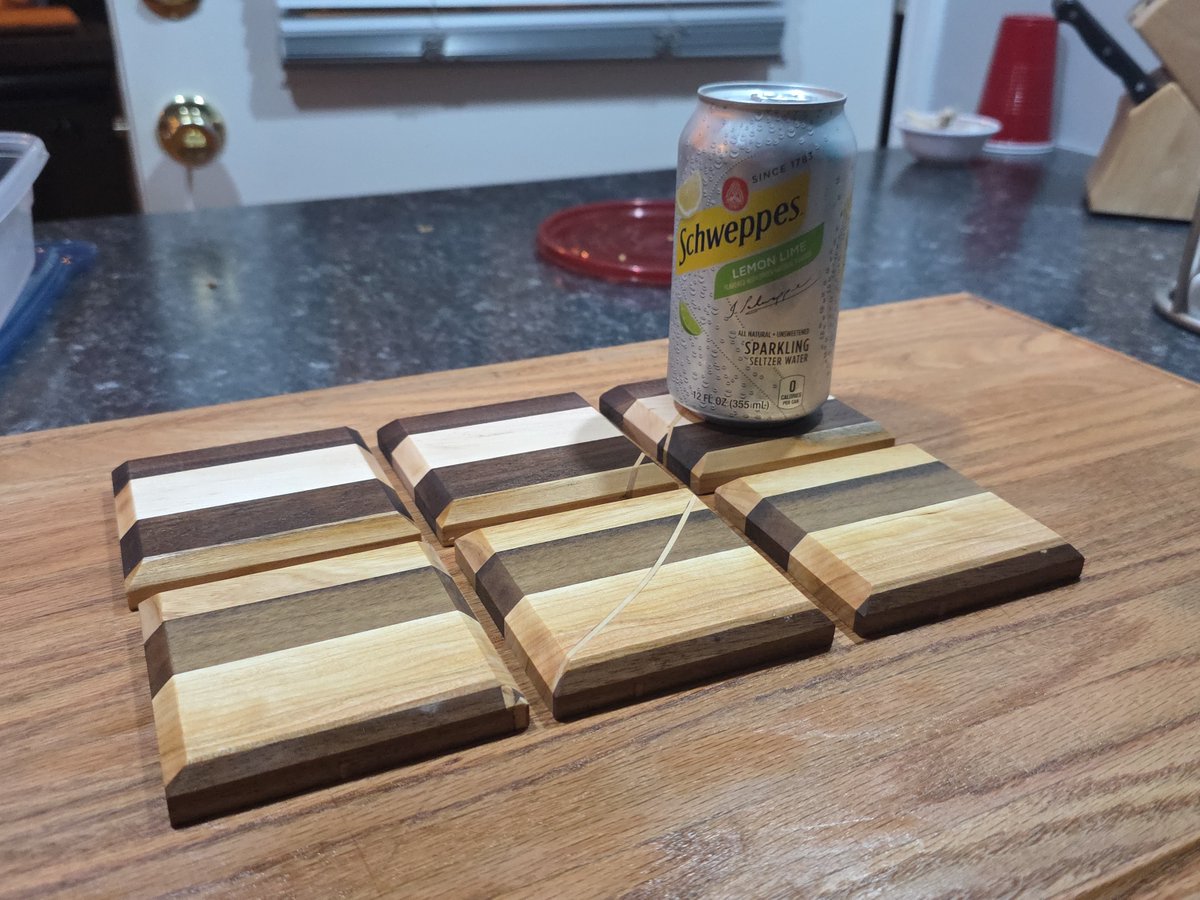 GDWorkbench's tweet photo. Hardwood coaster sets lined up for finish—the oil immediately deepens the walnut, cherry, and maple colors. Project GD-P-359: https://t.co/7aHKEWpwai #GDWorkbench #Woodworking https://t.co/Ec7xYiYVHD