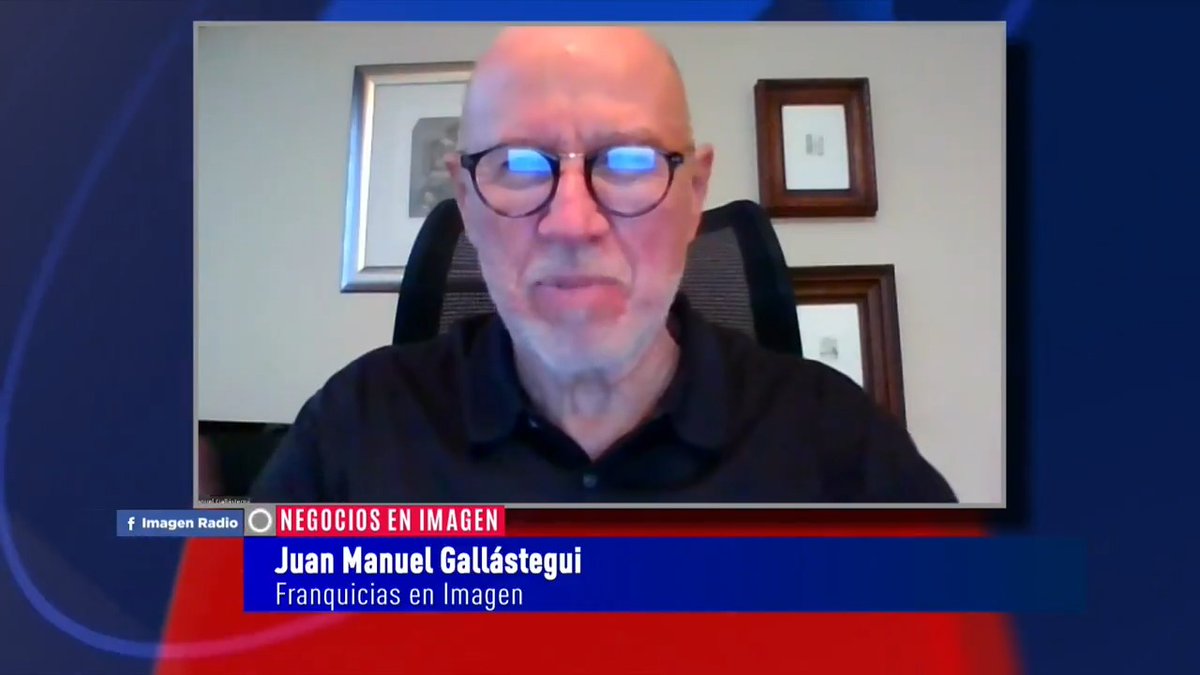 A news interview broadcast screenshot showing a bald man with glasses, with a lower third identifying him as 'Juan Manuel Gallástegui, Franquicias en Imagen' on the Imagen Radio program 'Negocios en Imagen'.