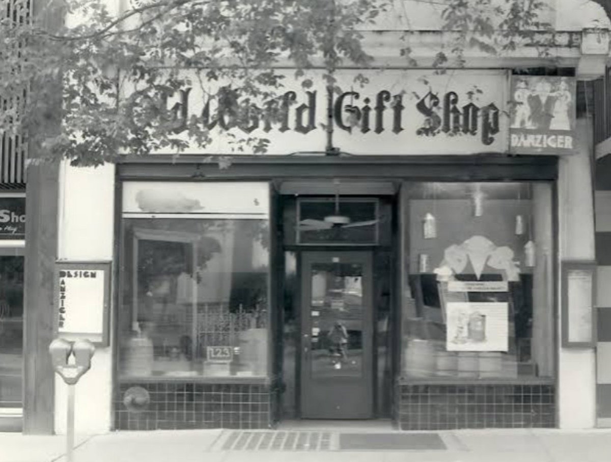 bud33345's tweet photo. On this day in North Carolina history September 30, 1948.

The Rams Head Rathskeller opened down in Amber Alley off Franklin Street in Chapel Hill. Folks just called it The Rat.

Ted Danziger and his family opened it in the basement under the old candy shop. They were Austrian folks who came over here and started over in Chapel Hill. First place around there to pour draft beer. Pizza showed up a few years later and that was a big deal for this part of the country back then.

The Daily Tar Heel ran an ad saying Andy Griffith was gonna wander around with his guitar welcoming people in. Think about that. Andy Griffith playing in a basement restaurant the night it opened.

That place fed generations of UNC students. Lasagna they called the bowl of cheese. The Gambler steak. Waiters who stayed for decades. Initials carved in the wood. Dates. Cheap beer. Loud nights. It was not fancy and it was not supposed to be.

The Rat closed in 2007. Building still sitting there under Franklin Street. Different things have come and gone in that space since.

If you ever ate there you remember it. If you never did, you missed a Carolina institution.

First picture is the alley entrance.
Black and white picture is the view from Franklin St. Old World Gift Shop upstairs and The Rat downstairs.