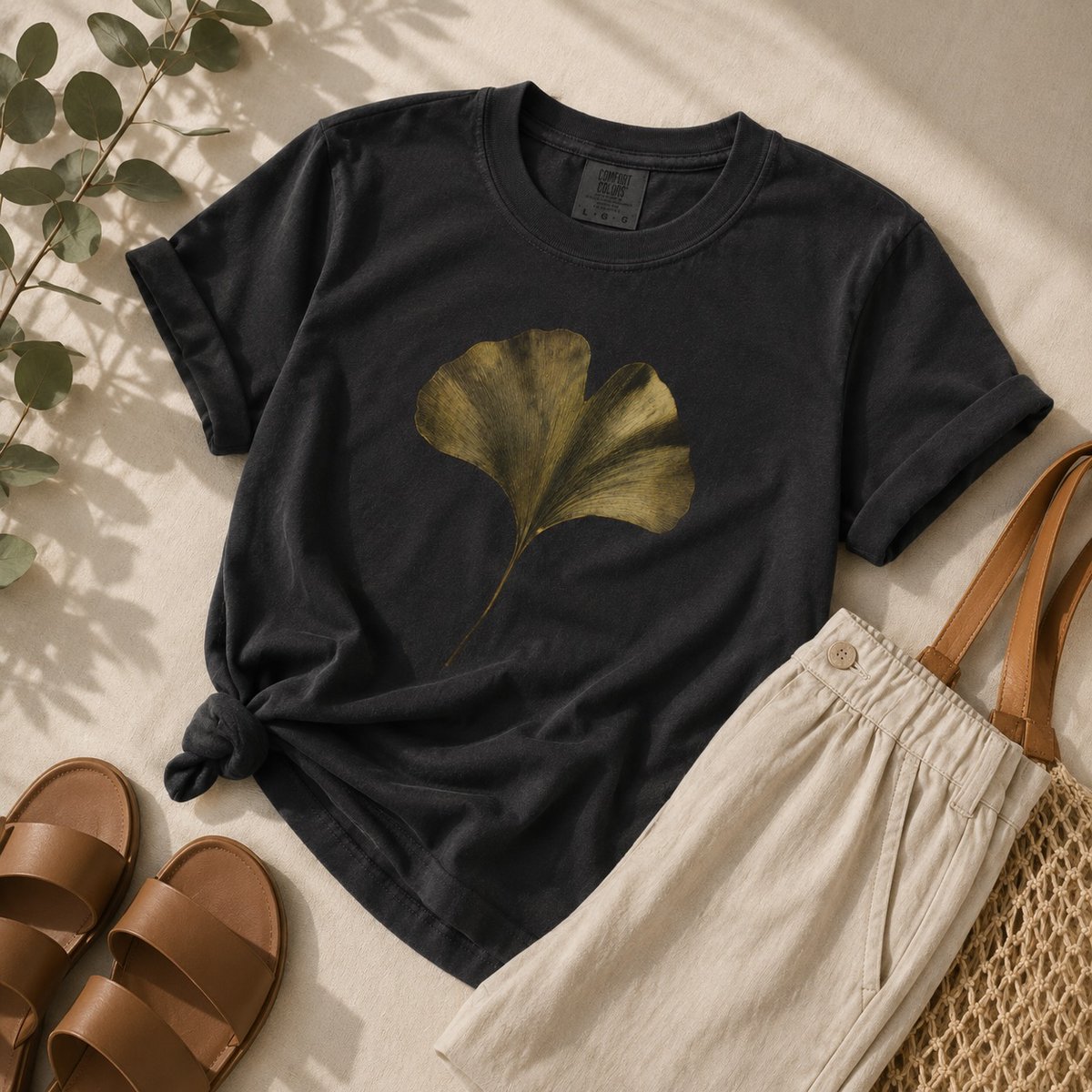 criza_26's tweet photo. A botanical classic made to be lived in. Our Ginkgo Leaf Shirt pairs timeless botanical art with garment-dyed cotton comfort. Muted tones and a statement leaf for understated, nature-inspired style. Inkasis botanical art, made wearable. https://t.co/yabZzgX0ff