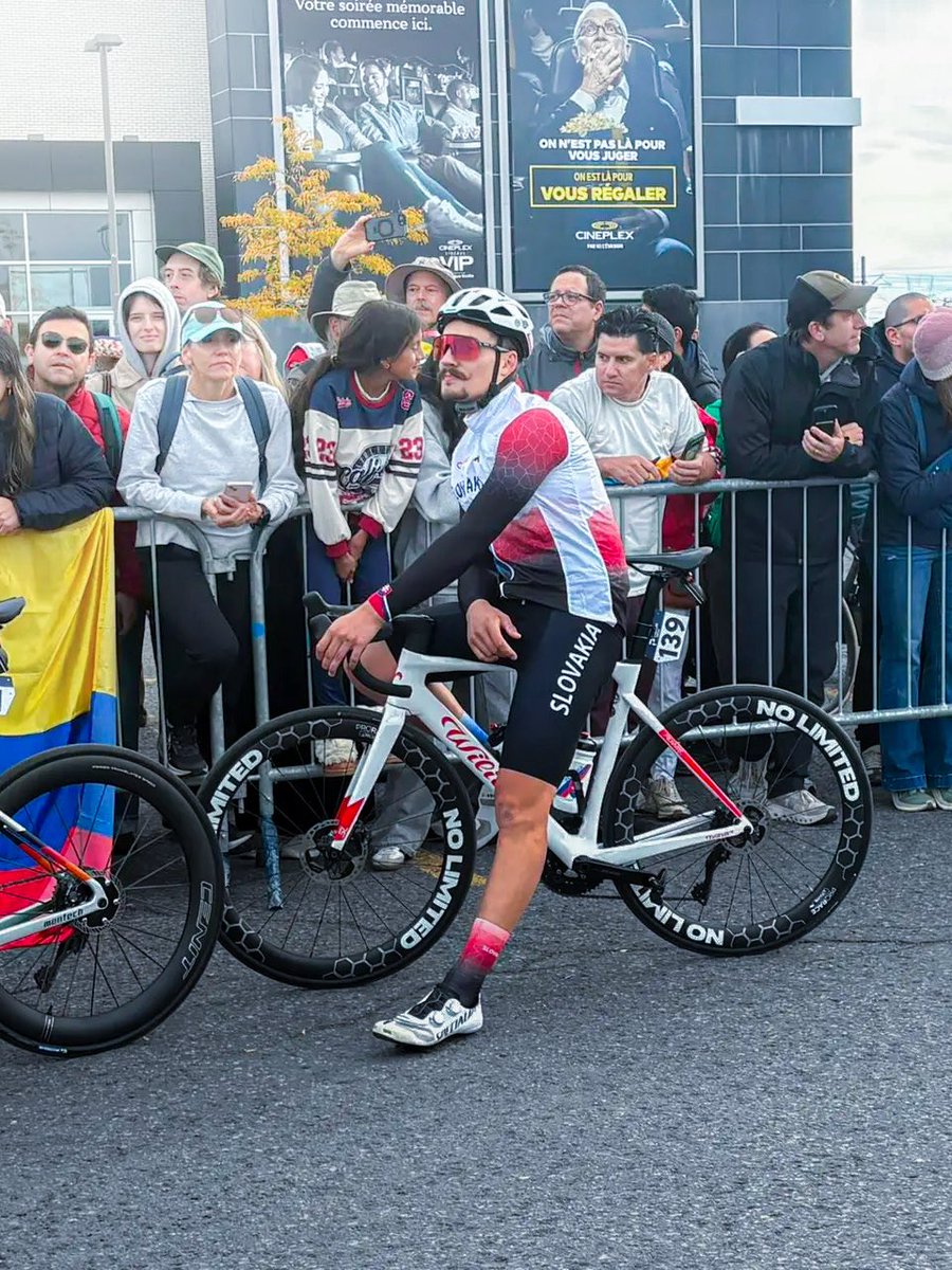 lucxsronald's tweet photo. Vladimír Kovačík this morning for Slovak TV JOJ:

“When they told me that I would be racing, I was just smiling, but the closer the race got, the more stressed I became. I couldn’t even open my phone or social media, because whenever I opened Instagram, my picture was everywhere, and I’m not really used to that.

When I stepped onto the podium, I was so stressed that I wasn’t even able to find my number where I was supposed to sign in. But after all the interviews and once the race started, it got better.

Our coach Jakub Vančo just told me to enjoy it, and I wanted to test myself and see how many kilometres I would be able to hold on. 

During the first 15–20 km, I tried to stay at the back, but in the meantime I even moved a little bit into the first third. I was happy that I managed to stay with the peloton at an average speed of 47 km/h until the circuits and that I was able to ride on the bridge.

Some of the biggest names of the pro cycling world even came to me during the race, shook my hand and told me some nice words. It was beautiful.

I only came home today, but tomorrow I’m going to the European Championships, this time really just as a masseur.”