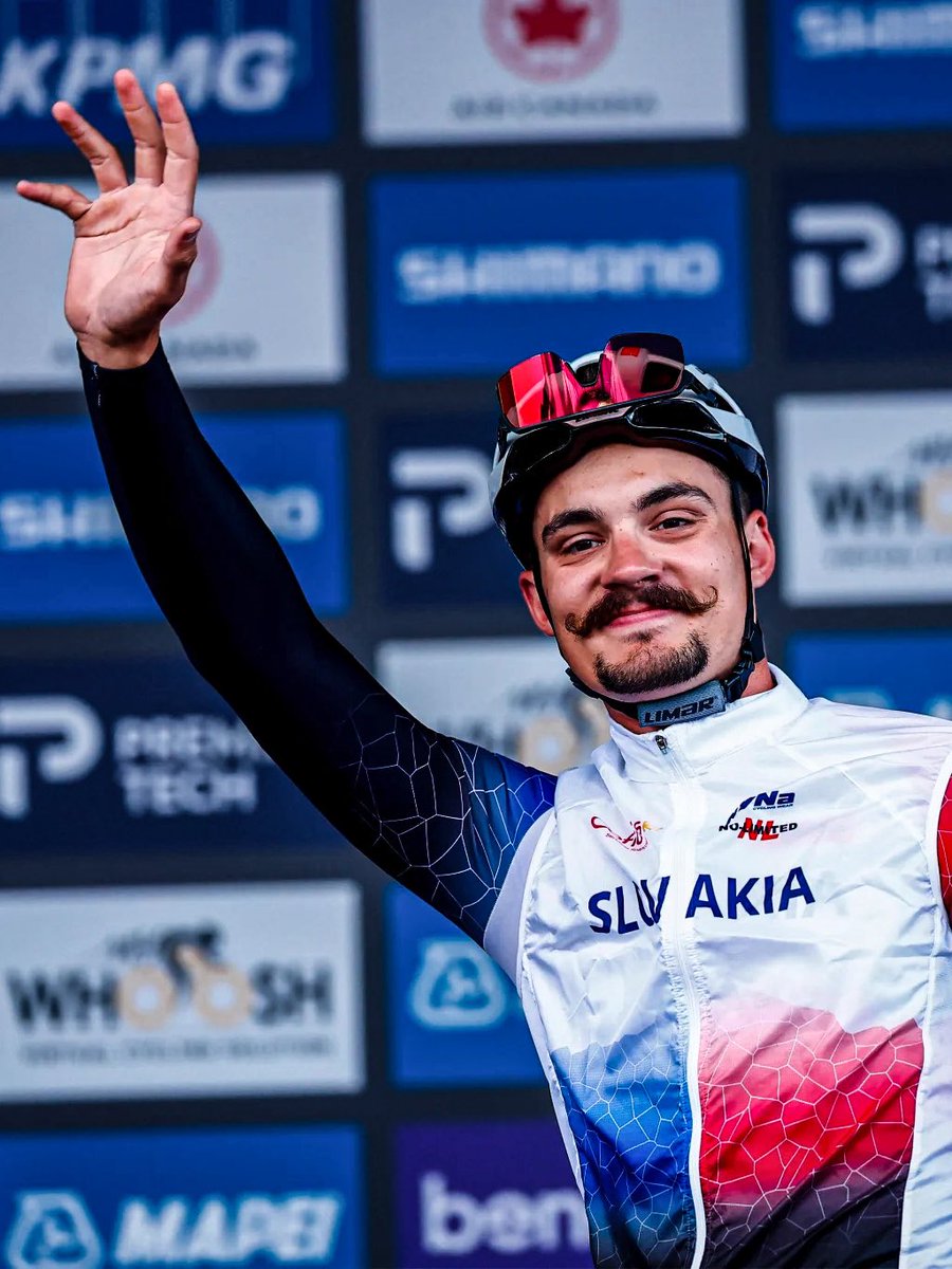 lucxsronald's tweet photo. Vladimír Kovačík this morning for Slovak TV JOJ:

“When they told me that I would be racing, I was just smiling, but the closer the race got, the more stressed I became. I couldn’t even open my phone or social media, because whenever I opened Instagram, my picture was everywhere, and I’m not really used to that.

When I stepped onto the podium, I was so stressed that I wasn’t even able to find my number where I was supposed to sign in. But after all the interviews and once the race started, it got better.

Our coach Jakub Vančo just told me to enjoy it, and I wanted to test myself and see how many kilometres I would be able to hold on. 

During the first 15–20 km, I tried to stay at the back, but in the meantime I even moved a little bit into the first third. I was happy that I managed to stay with the peloton at an average speed of 47 km/h until the circuits and that I was able to ride on the bridge.

Some of the biggest names of the pro cycling world even came to me during the race, shook my hand and told me some nice words. It was beautiful.

I only came home today, but tomorrow I’m going to the European Championships, this time really just as a masseur.”