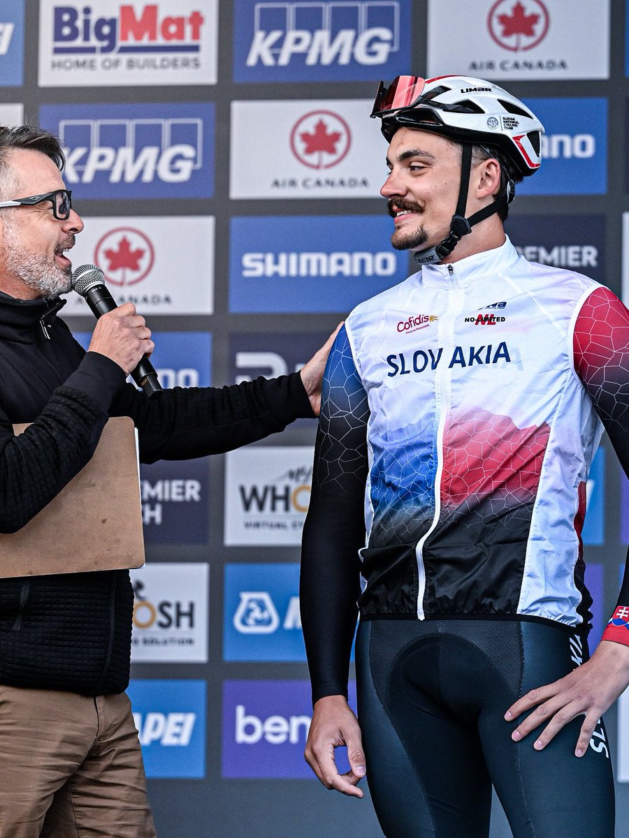 lucxsronald's tweet photo. Vladimír Kovačík this morning for Slovak TV JOJ:

“When they told me that I would be racing, I was just smiling, but the closer the race got, the more stressed I became. I couldn’t even open my phone or social media, because whenever I opened Instagram, my picture was everywhere, and I’m not really used to that.

When I stepped onto the podium, I was so stressed that I wasn’t even able to find my number where I was supposed to sign in. But after all the interviews and once the race started, it got better.

Our coach Jakub Vančo just told me to enjoy it, and I wanted to test myself and see how many kilometres I would be able to hold on. 

During the first 15–20 km, I tried to stay at the back, but in the meantime I even moved a little bit into the first third. I was happy that I managed to stay with the peloton at an average speed of 47 km/h until the circuits and that I was able to ride on the bridge.

Some of the biggest names of the pro cycling world even came to me during the race, shook my hand and told me some nice words. It was beautiful.

I only came home today, but tomorrow I’m going to the European Championships, this time really just as a masseur.”