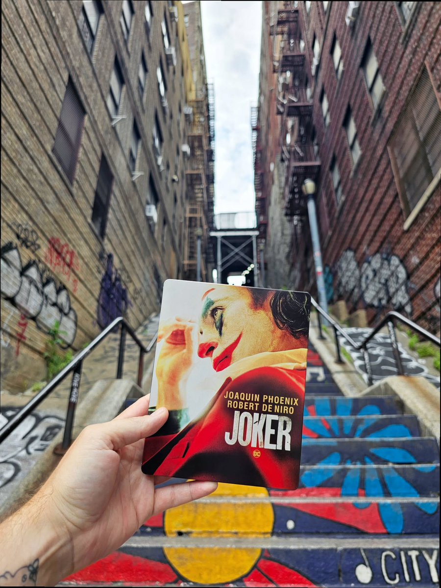 SheWolfMT's tweet photo. Photo by dutchmoviegeek on July 17, 2026. May be an image of a fire escape, a book, and text reading “JOAQUIN PHOENIX ROBERT DE NIRO JOKER CITY”. https://t.co/QzRFr8KDS1