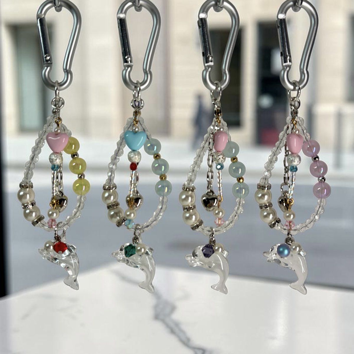 flowerflow87's tweet photo. キッズ向けのアクセサリーも制作中✨子供っぽくなりすぎないよう、パステルやイルカチャームなど可愛い要素もありつつ、シルバーハートやクリスタルでちょっぴり大人なストラップにしました💓真ん中にマジカルワンドつけて遊んでみた😊
#キッズアクセサリー
#矢向地区センター https://t.co/KEN4F8g8X4