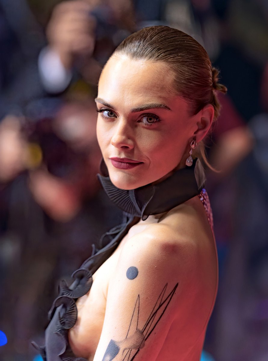 Weirdcoll7's tweet photo. Photo by Jean Luc Bouazdia at the Palais des Festivals in Cannes with Cara Delevingne. May be a close-up of one or more people, makeup, costume, and text. https://t.co/vXJuYeqz2b
