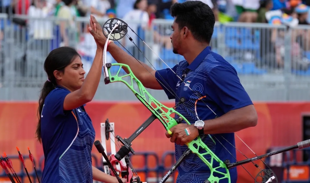 InqalabNewsIN's tweet photo. Sahil Jadhav, Chikitha Taniparthi win gold in compound mixed archery at Asian Games, secure 2028 Olympic quota https://t.co/BQWHiMAD2H #india #inqalabNews https://t.co/coavAe3ZzV