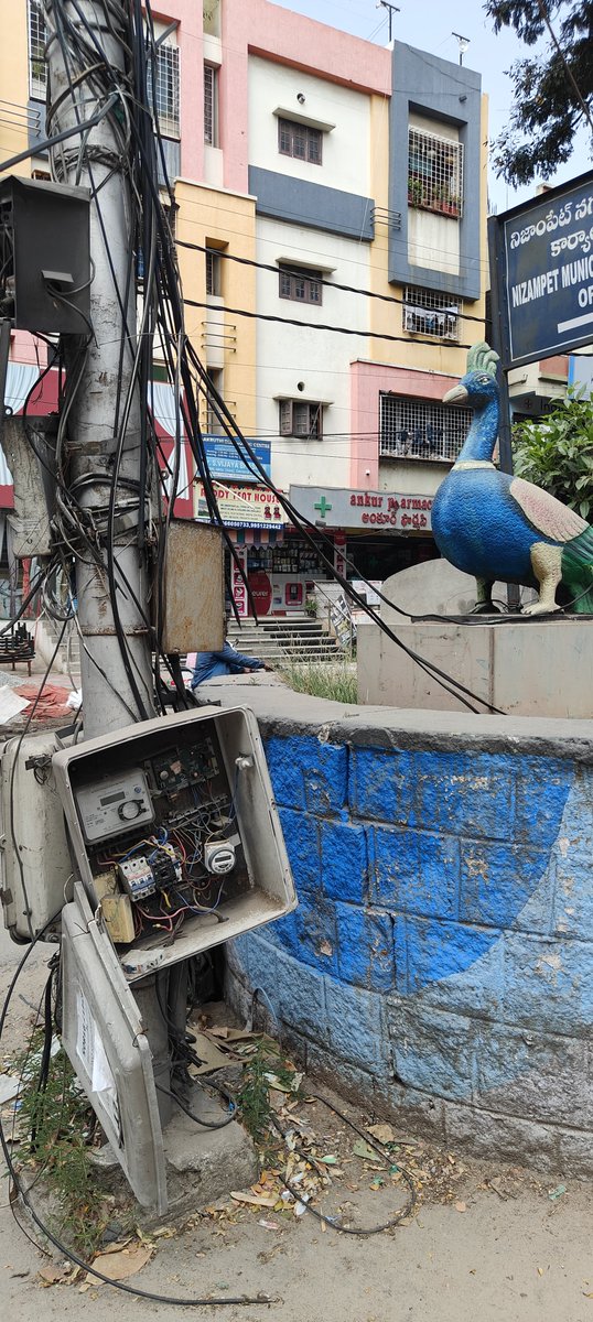 Ramanvs5682's tweet photo. @CMC_Offcl @DC_Nizampet @zcquthbullapur ⚠️ Electrical power boxes at Pragati Nagar Peacock Junction left open, a serious safety risk to pedestrians, children, nearby residents. Requesting concerned authorities to please close. This location is very close to the Municipal Office. https://t.co/FC9WYyzksm