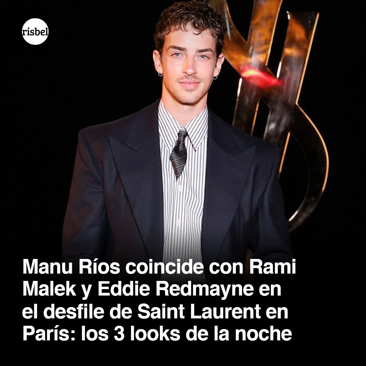 RisbelMag's tweet photo. Manu Ríos volvió a la primera fila de Saint Laurent con un traje azul de raya diplomática. En París coincidió con Rami Malek y Eddie Redmayne.

#ManuRios https://t.co/gLQ9MFbSYk