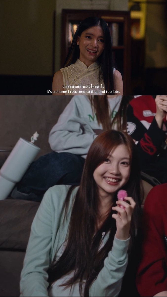A woman in traditional attire smiles while a subtitle reads 'it's a shame I returned to thailand too late,' with another woman below smiling and holding a pink microphone.