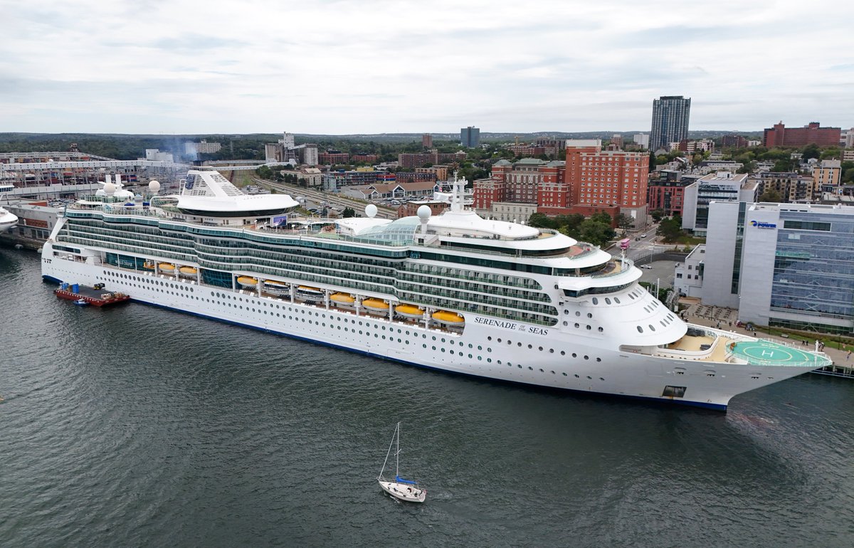 HookedCruising's tweet photo. Serenade of the Seas becomes Royal Caribbean's first ever San Diego homeport this month, and here's what the mega-ship crowd doesn't know: the aerialist act flying through the five-story glass Centrum is the best show on the ship. Tiny theater, giant wow factor. #CruiseLife https://t.co/5Pjh7GT9ut