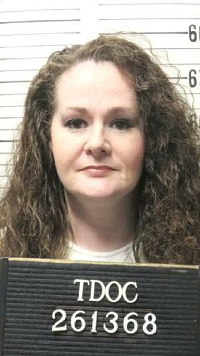 A mugshot shows a woman with long curly brown hair holding a placard reading "TDOC 261368" (Tennessee Department of Correction inmate number 261368), against a height chart background. This is Christa Gail Pike, who is set to become the first woman executed in Tennessee in over 200 years for a 1995 murder committed at age 18.