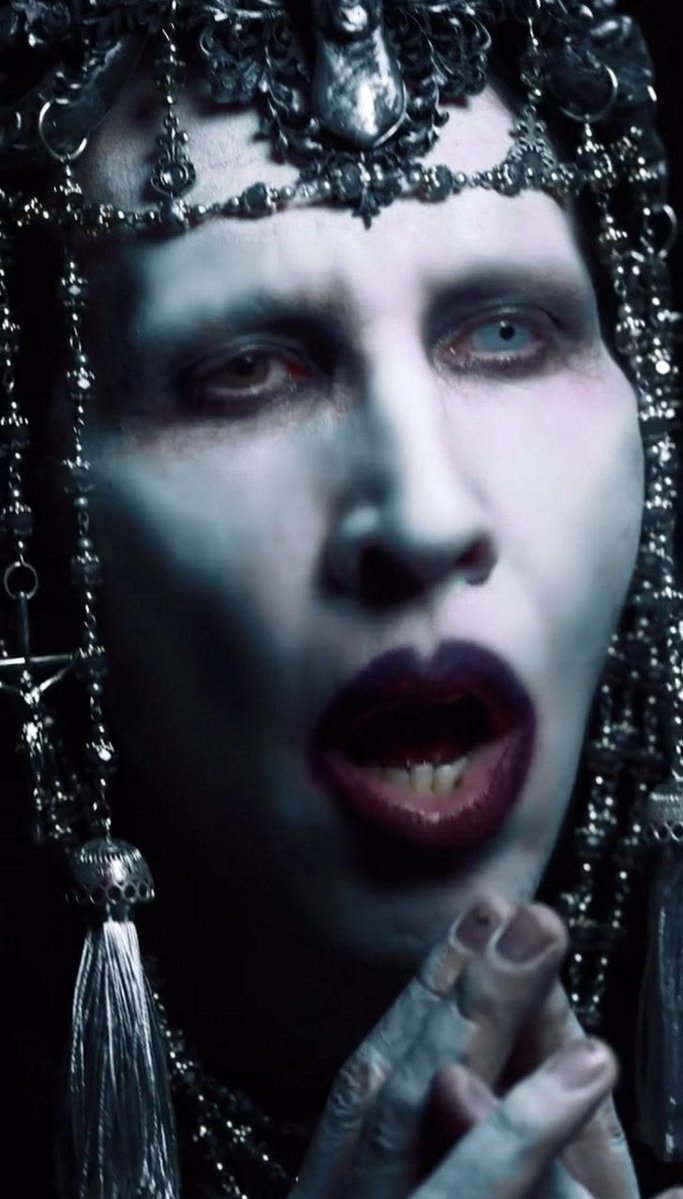 Goretober13's tweet photo. The last true shock rocker refused to conform to gender and societal boundaries with kickass music and provocative mv, dismantling censorship, religion,politics,celebrity worship and after 30+ years..cancel culture.His fanbase will always exist!👑😈😍🌹❤️‍🔥#Mansontwt #marilynmanson https://t.co/KSI5UepZX3