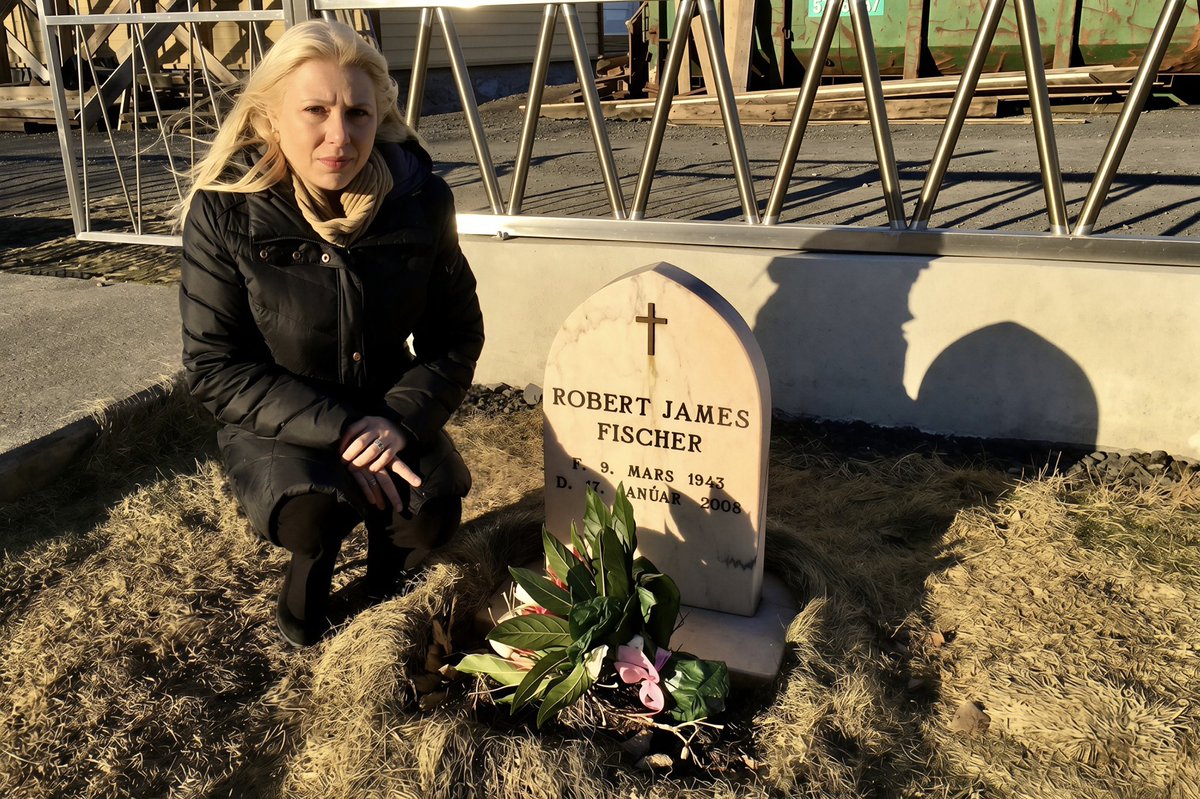 SusanPolgar's tweet photo. On March 24, 2005, Bobby Fischer arrived in Reykjavík, the city where he would spend the rest of his life. He was wearing his favorite custom-made Birkenstock sandals.

He had spent nearly nine months in a Japanese immigration detention center after his arrest on July 13, 2004, for attempting to travel on a revoked U.S. passport.

To help him avoid deportation to the United States, where he was wanted for violating U.S. economic sanctions by playing a 1992 chess match in Yugoslavia, the Icelandic Parliament granted him full citizenship on March 21, 2005. Three days later, he arrived in Reykjavík.

He remained there until his death on January 17, 2008, at the age of 64, matching the number of squares on a chessboard. ♟️

The photos at the bottom are from when I visited his grave. I was much more emotional than I expected.

The photo with the chessboard shows one of the starting positions from Fischer Random, using the current rules that we created together, rules that are now used worldwide.

I wrote about Bobby Fischer and, in detail, how I helped him finalize the rules for Fischer Random through our countless games together in Budapest, in my memoir, Rebel Queen.(https://t.co/lY5ayc0OAW).

I also included two Fischer Random positions in my book: one using the initial rules and another using the finalized rules we worked on.

#BobbyFischer 

@FIDE_chess @ECUonline @USChess