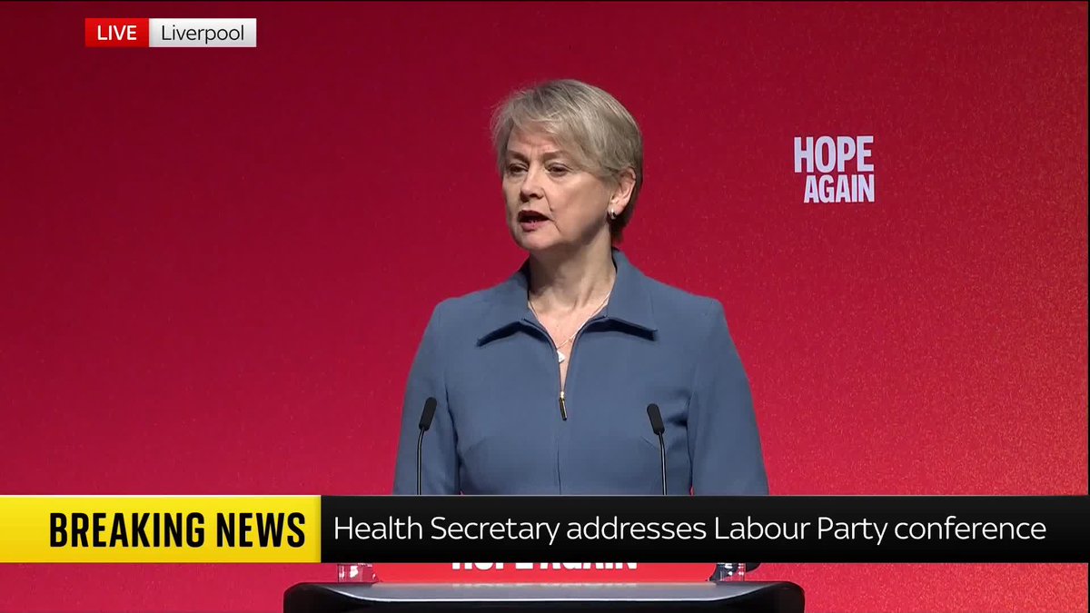 A live news broadcast from Liverpool with a 'BREAKING NEWS' ticker reading 'Health Secretary addresses Labour Party conference', showing a woman speaking at a podium with 'HOPE AGAIN' displayed on the red background.