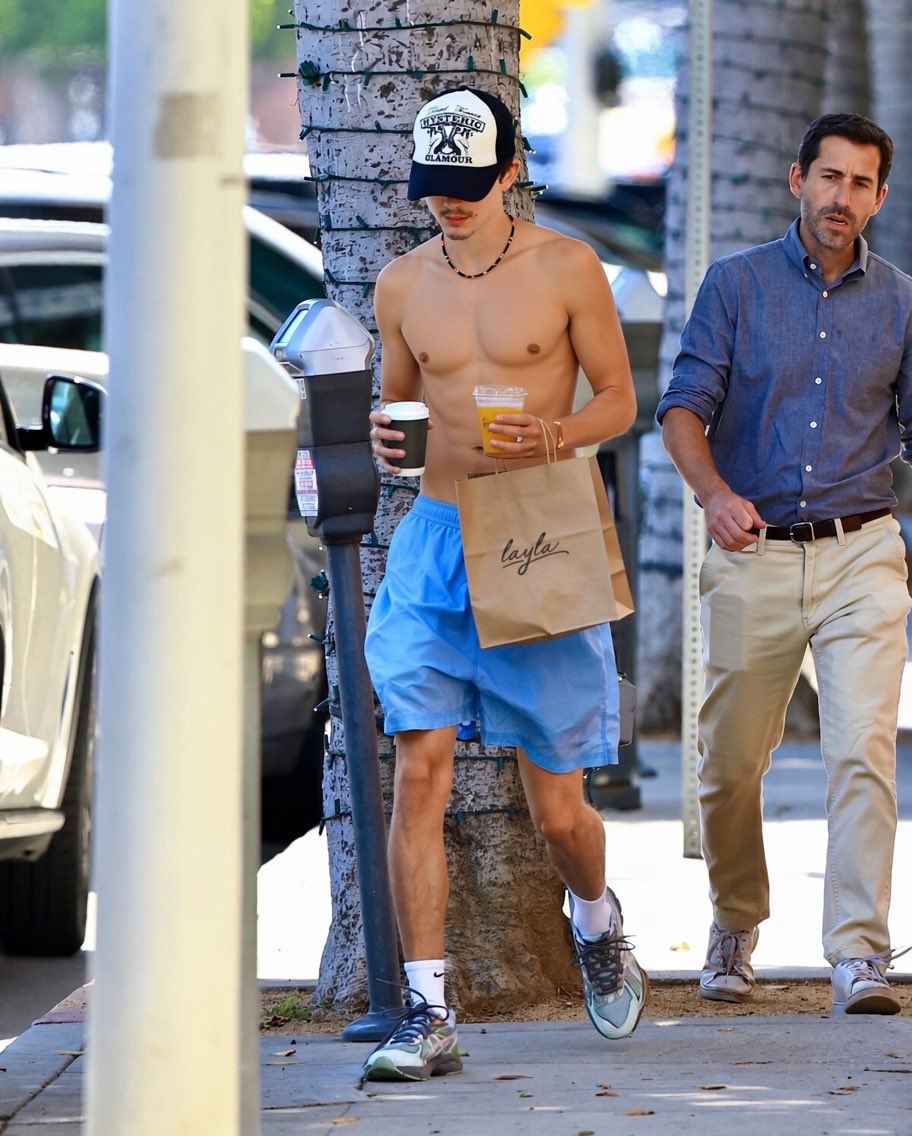 CrimsonHea4rt's tweet photo. Timothee Chalamet shirtless wearing a blue shorts while getting his morning coffee in Los Angeles 😍🌈 https://t.co/S2IEVORG9u