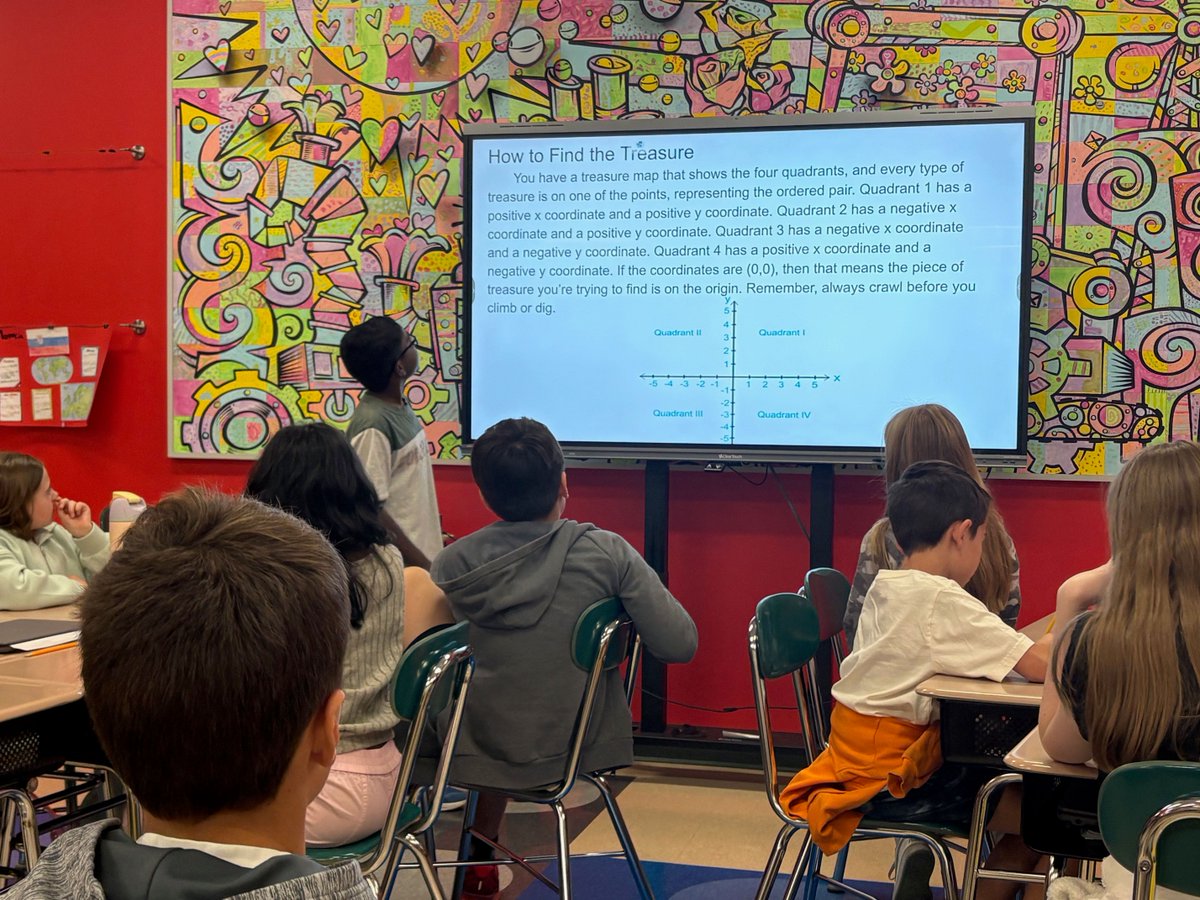 SouthFayetteEA's tweet photo. In Mrs. Bell's classroom, a fifth grade student took the lead & taught the class about Quadrants II through IV using a coordinate-plane treasure hunt. Student-centered learning at its best: demonstrating understanding while engaging classmates. #SouthFayetteEA #StudentLedLearning https://t.co/gbrkHG3hMq