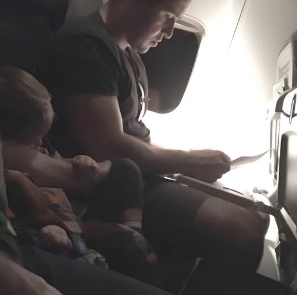 feelgoodtale's tweet photo. We flew on Westjet Flight #1221 from Fort Lauderdale at 9:30pm, landing in Toronto after midnight, with my toddler whose only other flight was just the week before. 
When I first saw you—a big, tough-looking guy in your late twenties—I worried you might not like sitting next to a small child. I was wrong, and I’m so thankful for that.

Because of turbulence, the seatbelt sign stayed on for much of the flight. That meant instead of sitting on my lap or grandpa’s for comfort, my son had to stay buckled in right beside you.
I never got your name, but thank you for all the small, thoughtful things you did. Thank you for picking up his blanket every time he dropped it, half-asleep. Thank you for turning your light away when he finally drifted off. Thank you for being kind and talking to him even when you didn’t have to. Thank you for offering him (and us) candy and gum to help with his ears. Thank you for letting his little legs and feet rest on you. And thank you for getting our bags down so he wouldn’t be disturbed.

My son is usually calm and quiet, but I was nervous about how these first flights would go. Small, tired kids can make people impatient, and not everyone shows kindness.

You turned that flight into a reminder of compassion and patience. One day my little boy will grow into a man, and I hope he learns from people like you. Your simple actions meant more than you know. If you choose to be a father someday, you will be a wonderful one.