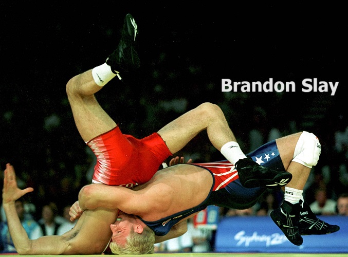 NWHOF's tweet photo. On September 30, 2000, USA Wrestling's Brandon Slay wins a gold medal and Sammie Henson wins a silver medal in freestyle at the Olympics in Sydney. #LegendsLiveOn

#NWHOF50 #SportForAll #GirlsWrestle #AnyBODYCanWrestle #thisiswhatawrestlerlookslike #LetsWrestle #GrowTheSport https://t.co/yfnrLHTPkk