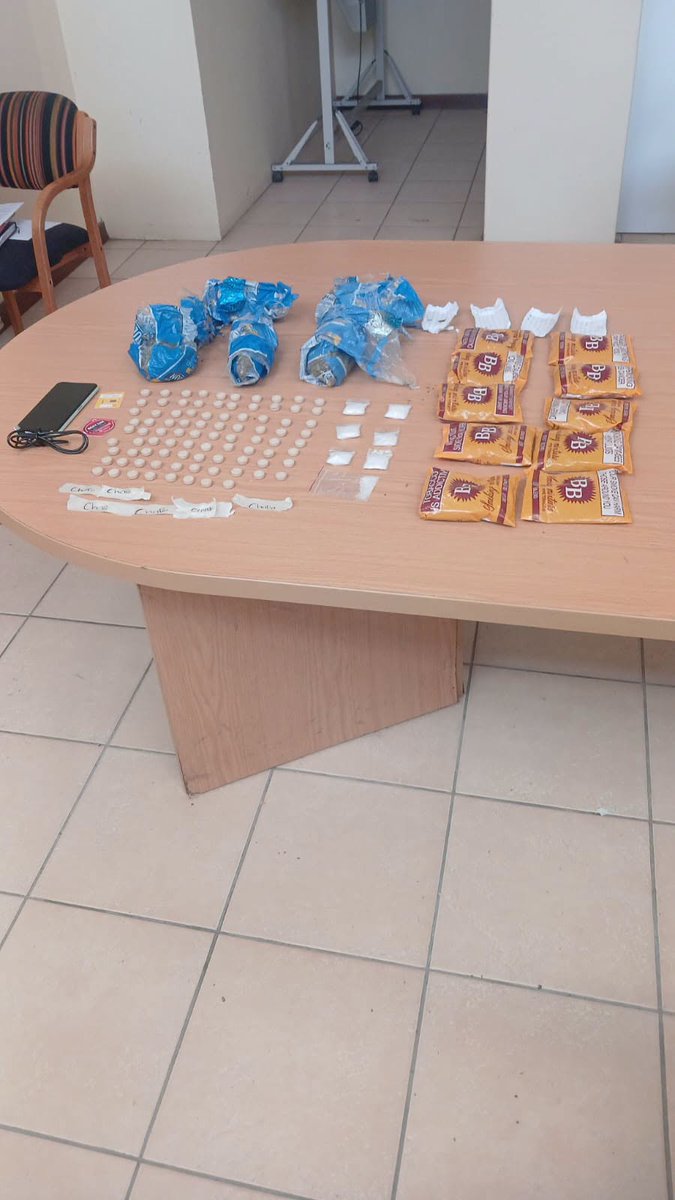 SAPoliceService's tweet photo. #sapsWC [WYNBERG POLICE ARREST 42-YEAR-OLD CLEANER FOR POSSESSION OF DRUGS IN COURT]
Wynberg #SAPS members received intelligence about a cleaner, employed at Wynberg Magistrate’s court who intended to hand over contraband to a detainee on Monday, 28/09.

They went to the mentioned court at about 07:30 and caught the suspect in the act. Police seized a bag containing 88 mandrax tablets, 10 packets of tobacco, seven packets of crystal meth, five packets of dagga, a cellphone with two sim cards and a charging cable. The 42yr-old male suspect was arrested on the spot for possession of illegal drugs.

On Tuesday, 29/09, the members conducted a search at the suspect’s office in the court building. They found a bag that allegedly belongs to the suspect and inside were 402 mandrax tablets, 41 sachets of crystal meth, one packet of cocaine, five packets of dagga, 14 cellphones with 16 various network sim cards and two cellphone chargers. The bag with its contents was seized and booked in as exhibit.

The suspect will make his first court appearance before the Wynberg Magistrate’s court on Wednesday 30/09. #DrugsOffTheStreets ME
https://t.co/xIHycwjdSx