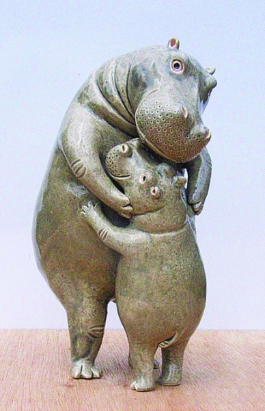 my_maria_430's tweet photo. A playful little magpie secretly pushes a cute chubby hippo as it gently bites a small bar—sweet, silly wildlife fun!， https://t.co/nNUdr4F51f