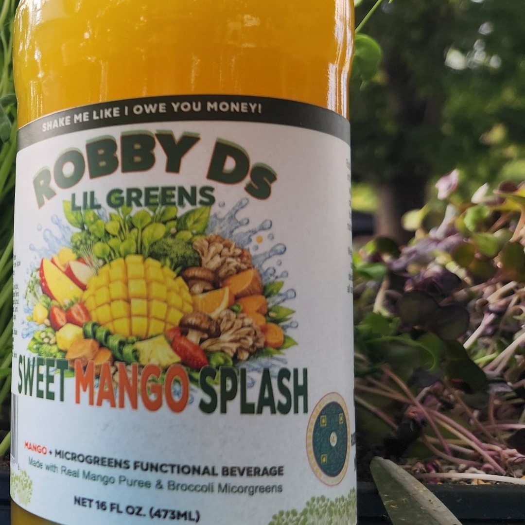RobbyDsLilGreen's tweet photo. Midweek honesty: most 'mango drinks' have never met a mango. Ours leads with real mango puree, smuggles in broccoli microgreens, and monk fruit keeps it from punching you in the face. Tastes like summer. Behaves like a vegetable. SHAKE ME LIKE I OWE YOU MONEY 🥭 #DrinkLocal https://t.co/6WvAuiHQBm