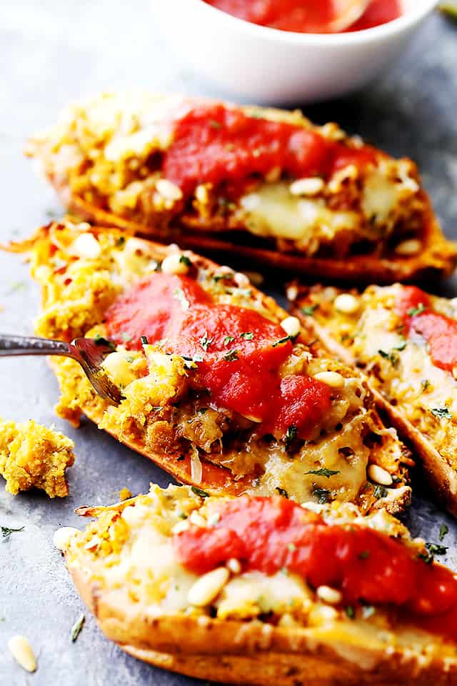 Diethood's tweet photo. These twice-baked sweet #potatoes are stuffed with basil pesto and Parmesan, then topped with melty Mozzarella and marinara sauce. #FoodMood #recipes https://t.co/bCEPCp9DPU https://t.co/pfLINs2qwI