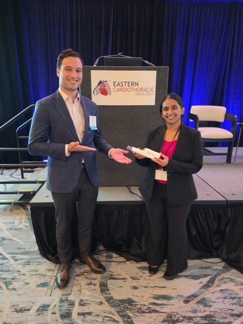 pennsurgery's tweet photo. PSOM MS2 Nina Nair presenting data at the #ECTSS2026 meeting on the positive impact of a novel digital incentive spirometer on outcomes after major chest surgery. Developed by Yi-An Hsieh and Josh Freedman, Department of Bioengineering at Penn. https://t.co/H3ZyaTNWCH