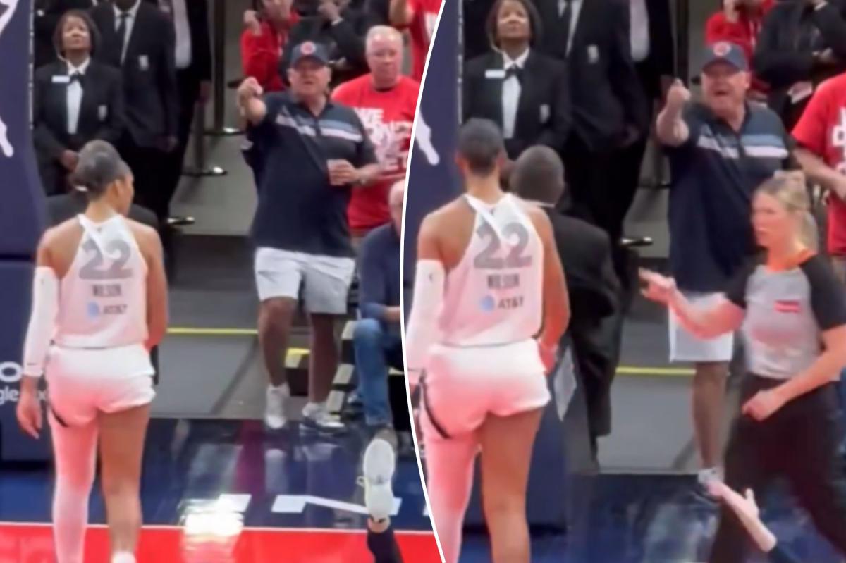 nypost's tweet photo. New angle emerges in wild A'ja Wilson confrontation with pointing Fever fan https://t.co/BjzeYulGH4 https://t.co/9jPZAYtIr7
