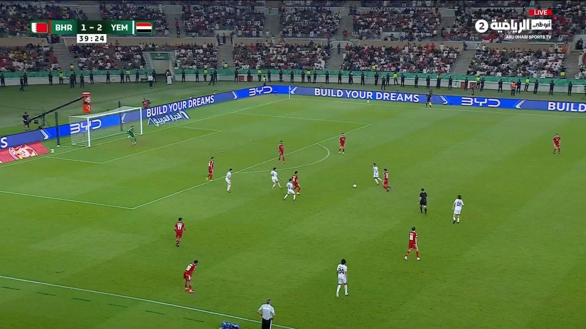 A live soccer match broadcast on Abu Dhabi Sports TV showing Bahrain vs Yemen with the score BHR 1-2 YEM at 39:24.