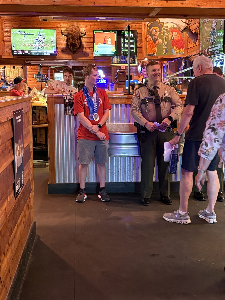 THPFallBranch's tweet photo. The Annual Tip-A-Cop fundraiser for @SOTennessee was held last evening at @texasroadhouse locations in the district. Troopers Egolf and Smathers and Sgt. McNulty made sure the sweet tea glasses were full at the Johnson City location! https://t.co/BqIwBra9XD