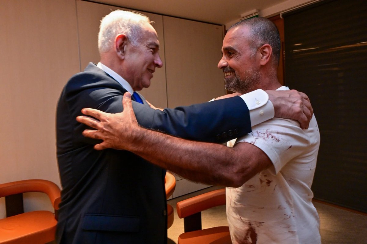 YaakovRenewed's tweet photo. Flydubai passenger who subdued pilot is met by Netanyahu still covered in blood.

How to says it’s a Psyop without saying it’s a Psyop. https://t.co/ORy3rlRUd4