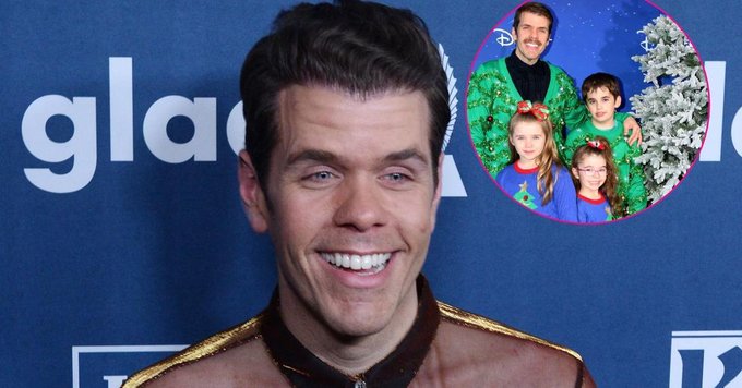 A smiling man in a brown jacket poses in front of a blue backdrop, with an inset circular photo showing him with three children near a Christmas tree.